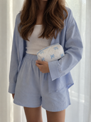 Trousse matelassée nœud bleu