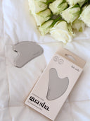 gua sha stein für gesichtsmassage und skincare routine